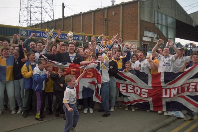 Leeds United fans celebrate title glory outside Elland Road.