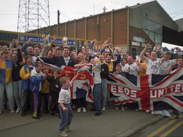 Leeds United fans celebrate title glory outside Elland Road.
