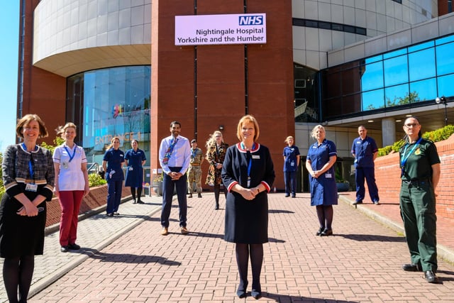 Pictures of the NHS staff recruited to run the new Nightingale Hospital in Harrogate outside the hospital at today's opening led by Chief Nurse Amanda Stanford and Medical Director Yvette Oade
