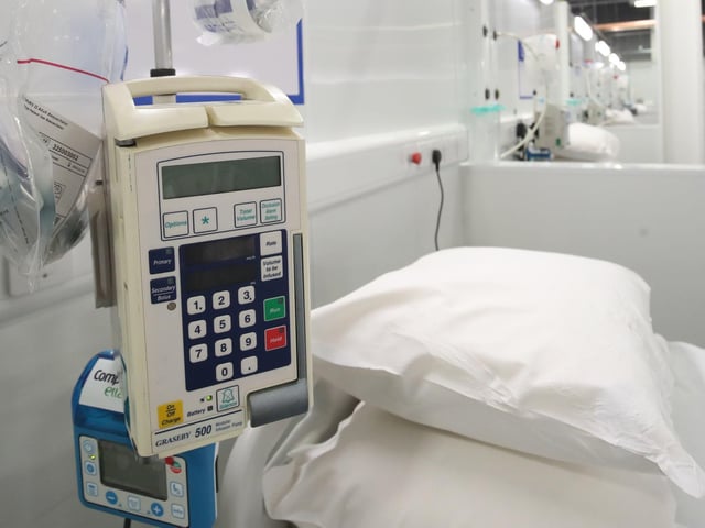 Medical equipment next to a bed at the NHS Nightingale Hospital Yorkshire and Humber in Harrogate, North Yorkshire.