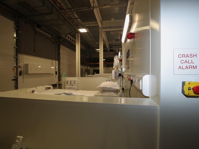 The emergency Crash Call Alarm next to a bed at the NHS Nightingale Hospital Yorkshire and Humber