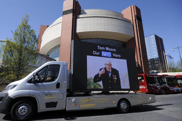A screen which reads: "Tom Moore - Our NHS hero."