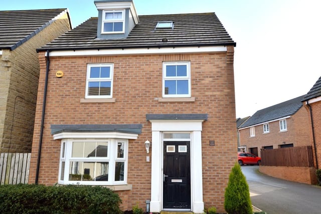 This four bedroom, three bathroom detached house is on a new residential property.