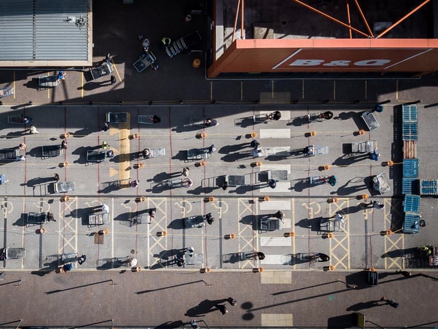Aerial images show huge queues of shoppers waiting to get into a B&Q store - just yards away from a NHS hospital treating coronavirus patients in Nottinghamshire.