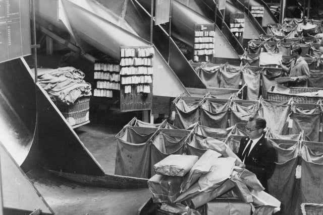Leeds Head Post Office. Parcels were being sorted by hand at West Street Parcels Office where the giant mechanical sorting machine had been halted by the Post Office engineers strike.