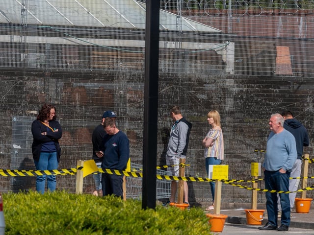 DIY lovers in Leeds keep 2 metres apart when queuing to get into B&Q in Killingbeck.