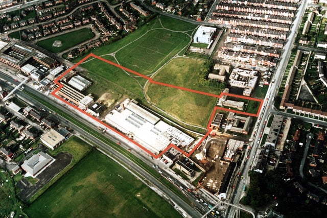 An aerial view showing York Road, with Harehills Lane on the right. In the top left is semi-detached housing of Torre Hill and Torre Crescent, and top right terraced housing of the Nowells; the white building next to these is a telephone exchange