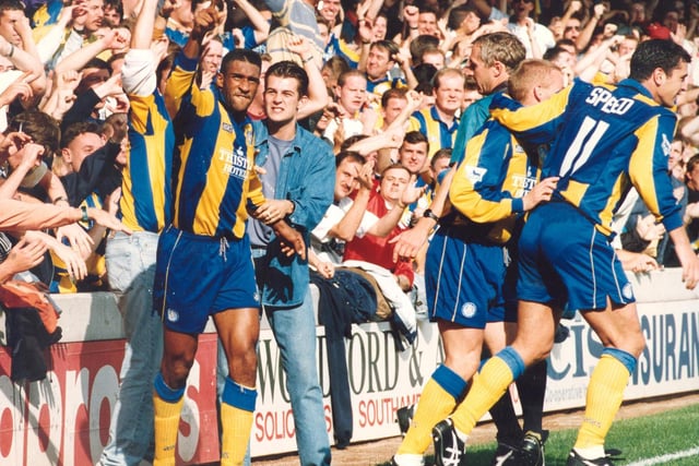 Brian Deane celebrates scoring at The Dell. Gary Speed also scored for the Whites that day on the south coast.