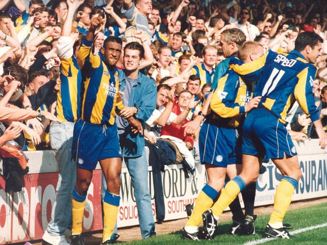 Brian Deane celebrates scoring at The Dell. Gary Speed also scored for the Whites that day on the south coast.