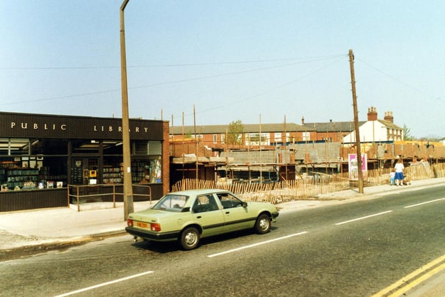 Selby Road showing, on the left, the old Halton Branch library. On the right the building site for the construction of the new library which would shortly replace it as part of a one million pound shopping centre development.