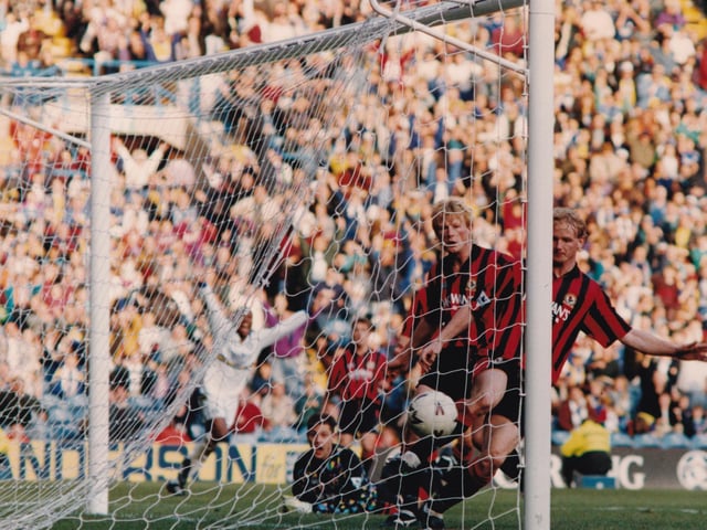 Blackburn goalkeeper Bobby Mimms can only watch as Gary McAllister's cross sneaks in off the chest of Tim Sherwood.