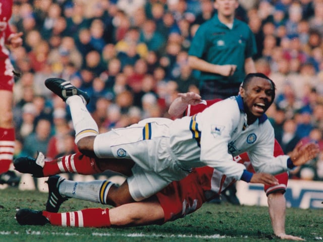 Rod Wallace is sent crashing after a clash with Red defender Julian Dicks.