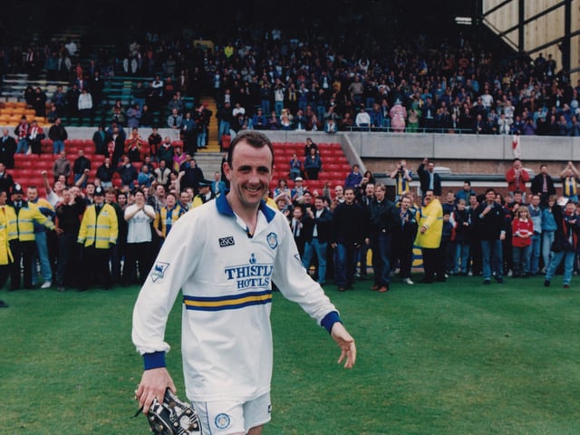 Leeds fans celebrate as Gary McAllister walks off at the County Ground after a five goal rout of Swindon, who conceded 100 league goals that season.
