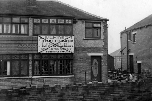 557 Dewsbury Road, the residence of Leonard Wilkinson. A painted sign to front of house advertising the services of Mr. Wilkinson Builder and Contractor has red line markings edited to photograph by city engineers implying sign has been erected without permission.