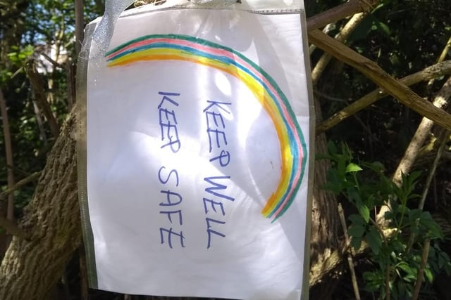 This homemade sign sharing best wishes has been hung in one of the trees near Gledhow Valley Woods.