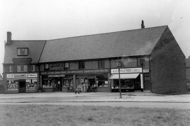 Shopping precinct at Middleton Park circus. Retail premises visible are, from right to left: A King, coal merchant; WA Appleyard and Sons, Confectioners; Leeds Industrial Co-operative Society General Store and Gallons Ltd, grocers.