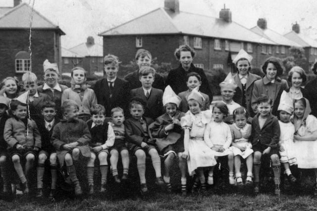 Young local residents taking part in a street party in Sissons Crescent to commemorate the coronation of Queen Elizabeth II in 1953.