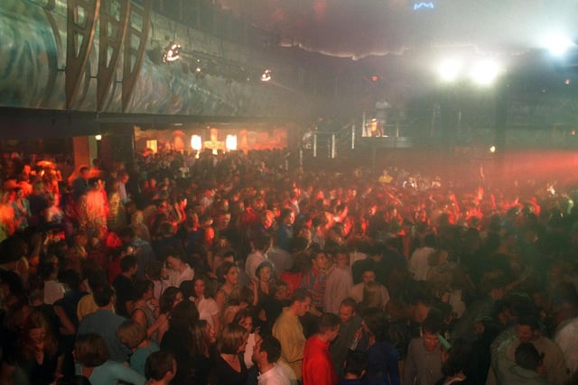 Clubbers packed out on the huge dancefloor. Long before social distancing!