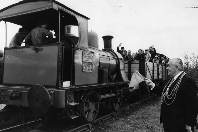 The Lord Mayor of Leeds, Councillor William Hudson, waves off a 1909 Windle 0-4-0 Burrows well tank locomotive, restored by the Middleton Light Railway.