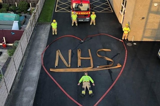 This bird's eye view shows Lancashire fire crews honouring their emergency service colleagues in the NHS on Thursday night (April 23)