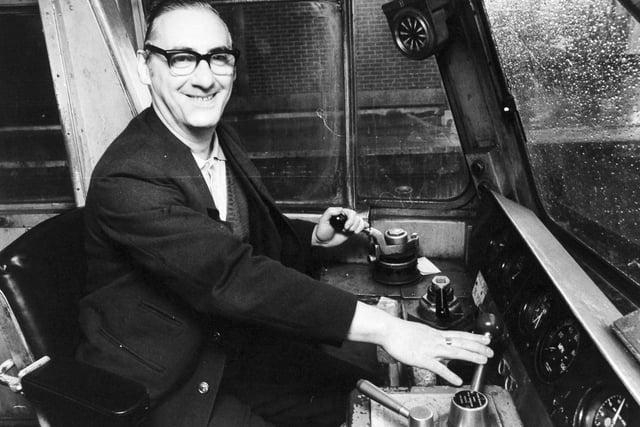 Ron Hoffman in the cab of his diesel electric locomotive at Leeds City Station.
