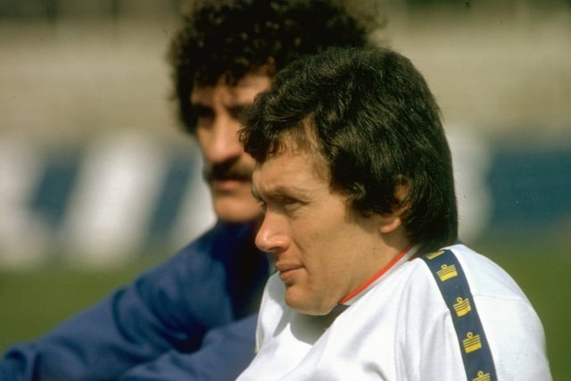 Trevor Cherry and Terry McDermott of England rest during training in 1980.