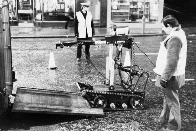 The Army's robot device for dealing with terrorist bombs, which was equipped with closed-circuit TV, is put back into its trailer after a bomb scare on Vicar Lane.
