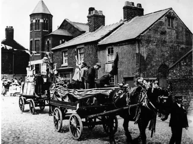 Poulton Whit Walk in the early 1900s passing the old Methodist Chapel on the corner of Chapel Street. The cottages still remain, but the chapel was demolished in 1964 after 150 years of Methodism in the town.