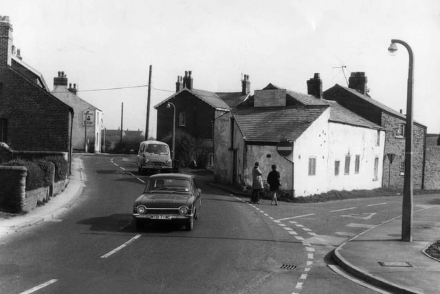 A view from 1974 of Staining Road at the junction with Staining Road West in the village of Staining.