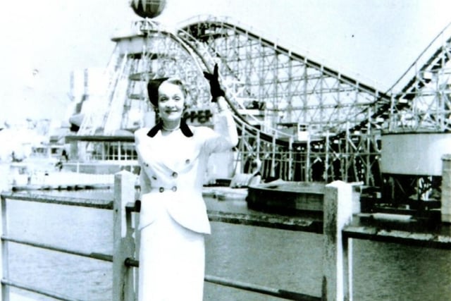 Hollywood actor Marlene Dietrich after riding the Big Dipper and losing a pearl earring