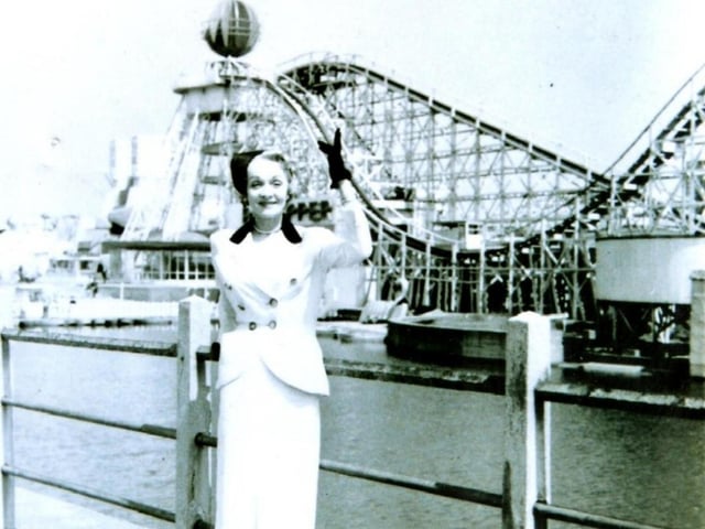 Hollywood actor Marlene Dietrich after riding the Big Dipper and losing a pearl earring