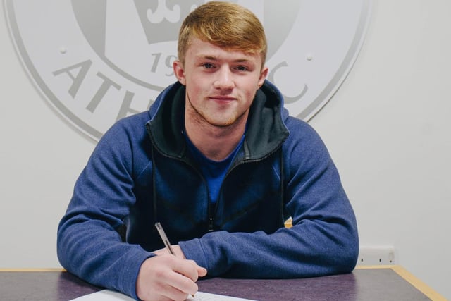 Signing his 'long-term' deal with Latics