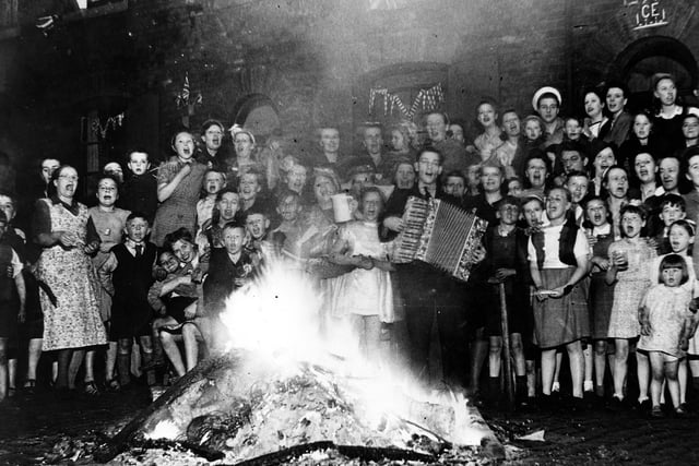 Many of the street parties held to celebrate the end of the war had the excitement of a bonfire as darkness fell. After years of black-out restrictions a bonfire was a great delight to young and old.
