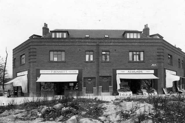 Parade of shops on Amberton Approach, Oakwood Lane. From left to right are Jarrett Bros, P. Bennett, confectioner, Almonds fish and fruit, Mittons Newsagent.