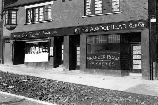 View of two businesses on Brander Road. On the right, at no 65 is A, Woodhead, Brander Road Fisheries, with J.A. Foster's Grocery business on the right.