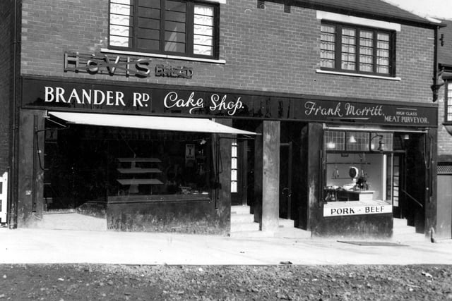 View of number 59 Brander Road which is Brander Road Cake shop and the premises of Mrs L. Rudge. Next door at 61 is Frank Morritt, Butchers.