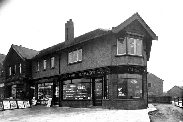 View of 'The Bakery' Prop: Miss Florence Gadsby at number 1 Hollin Park Parade with W & E Drennan, newsagents on the left at number 2 and Parade fruit stores at number 3.