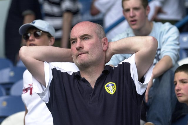 The agony is written all of the face of this Leeds United fan.