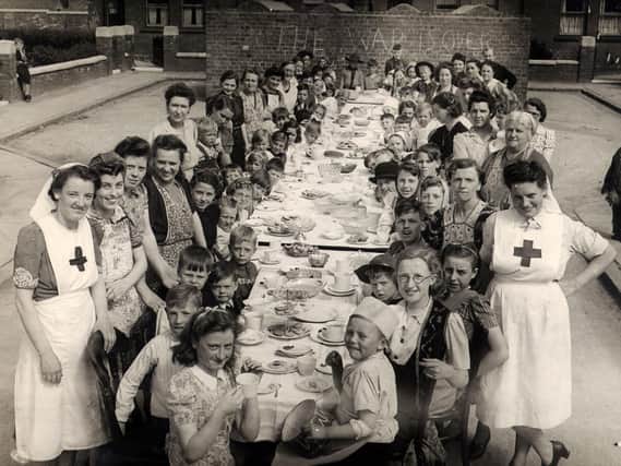 Residents of Dakins Road in Leigh 1945 celebrate the war is over on VE Day.