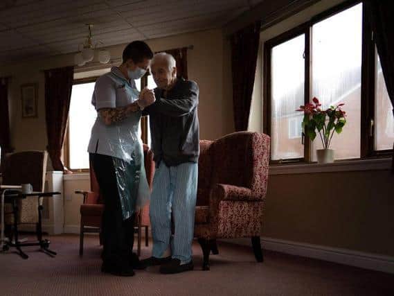 Jack Dodsley dancing with carer Kayleigh Jupp