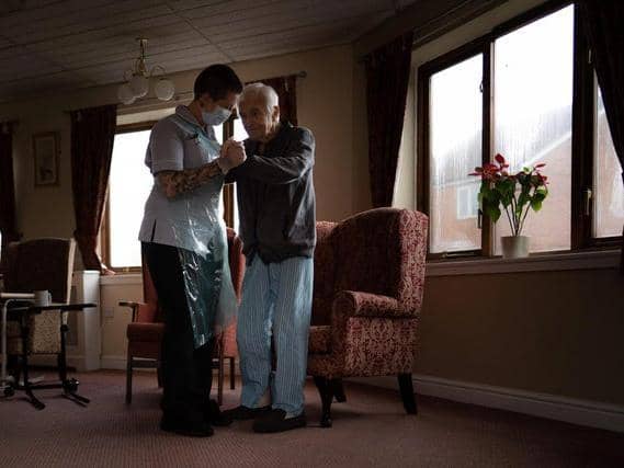 Jack Dodsley dancing with carer Kayleigh Jupp