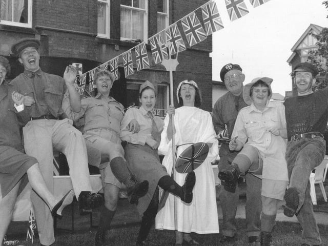 Staff at Queen Margaret's nursing home dance in the rain: Angela Price, Michael Parkin, Susan Parkin, Claire Sweeting, Margaret Brooke, Brian Parkin, Ellen Evans and Graham Pryce.