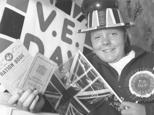 Jackie Alden, 13, goes back in time with her identity card and ration book.