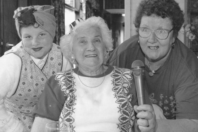 A singalong at Silver Birches in Filey; 10-year-old Gemma Kennedy and grandma Pauline Johnson, right, with day centre visitor Margaret Harrison.