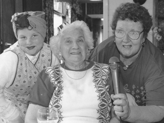 A singalong at Silver Birches in Filey; 10-year-old Gemma Kennedy and grandma Pauline Johnson, right, with day centre visitor Margaret Harrison.
