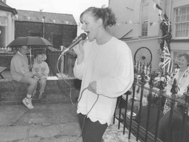 Sarah Broadbent has a go in the Princess Street karaoke competition.