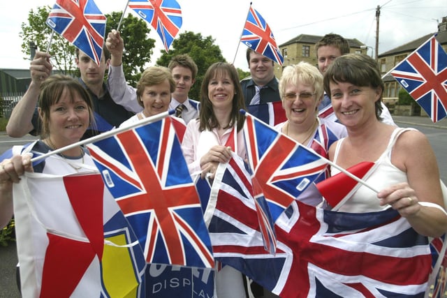 Staff at Porfolio Designs, Elland, with their VE Day bunting in 2005.
