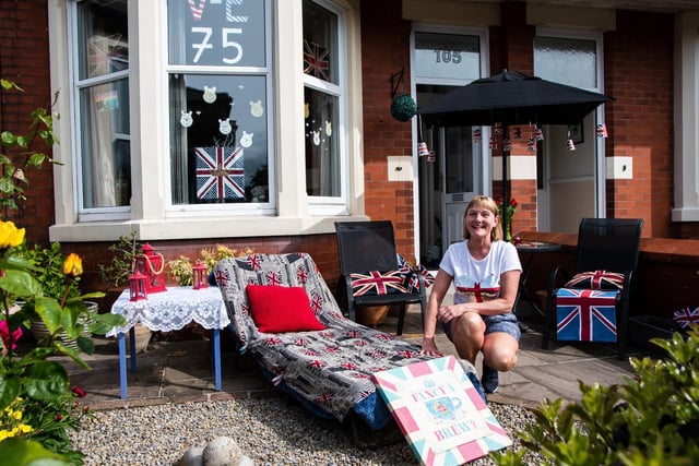 Gina Cairns from Lytham celebrating VE Day in her front garden.