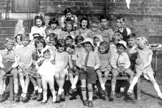 At home in the UK, rumours of an end to the war had been circling for days, and many people had prepared their celebrations. Here, a Yorkshire Sunday school gathers to mark the occasion.