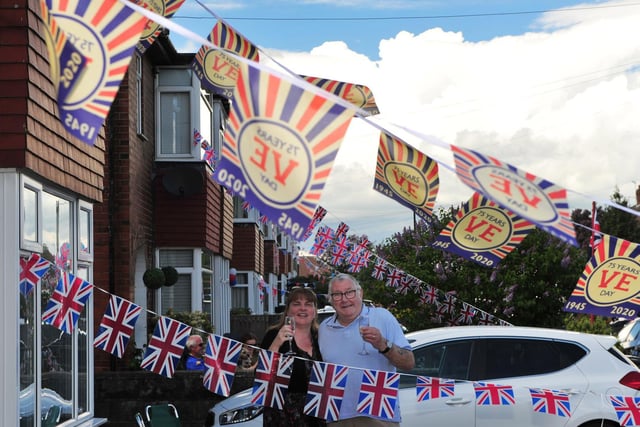 Mac and Helen Cook pictured in their garden surrounded by bunting at the St Johns Drive street party.